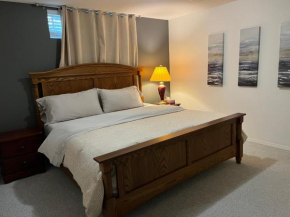 Licensed spacious basement suite with one king-size bed